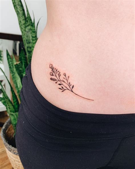 female hip tattoo|hip bikini tattoo.